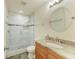Updated bathroom with a walk-in shower and granite vanity at 5372 Pamela Wood Way # 7, Sarasota, FL 34233