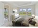 Main bedroom with large windows and access to the lanai at 4769 Tortona Ct, Bradenton, FL 34211