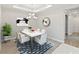 Elegant dining room with marble table, chandelier, and modern decor at 4769 Tortona Ct, Bradenton, FL 34211