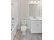 Bathroom with tub, toilet and vanity at 4769 Tortona Ct, Bradenton, FL 34211