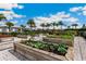 Community garden with raised garden beds and various plants at 4769 Tortona Ct, Bradenton, FL 34211