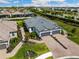 Two-car garage, walkway, and surrounding community at 4769 Tortona Ct, Bradenton, FL 34211