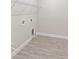 Laundry room with overhead shelving and tile flooring at 4769 Tortona Ct, Bradenton, FL 34211