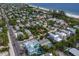 Aerial view of beachside home and neighborhood context at 118 Mangrove Ave, Anna Maria, FL 34216