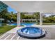 Resort-style pool with spa and outdoor patio, perfect for relaxation and entertaining at 118 Mangrove Ave, Anna Maria, FL 34216