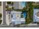 Aerial view of a home with a pool and deck; close to the beach at 118 Mangrove Ave, Anna Maria, FL 34216
