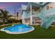 Private backyard with a pool and patio, great for relaxing at 118 Mangrove Ave, Anna Maria, FL 34216