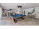 Game room with pool table, bar, and shuffleboard at 118 Mangrove Ave, Anna Maria, FL 34216