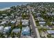 Aerial view of the property and its surroundings near the beach at 118 Mangrove Ave, Anna Maria, FL 34216