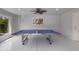 Ping pong table in a bright, well-lit game room at 118 Mangrove Ave, Anna Maria, FL 34216