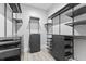 Large walk-in closet with ample shelving and drawers at 118 Mangrove Ave, Anna Maria, FL 34216