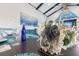 Coastal-themed dining table centerpiece with octopus decor at 118 Mangrove Ave, Anna Maria, FL 34216