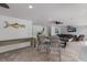 Game room with pool table, shuffleboard, and bar area at 118 Mangrove Ave, Anna Maria, FL 34216