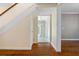 Hardwood floors and view into sunroom at 7754 Westmoreland Dr, Sarasota, FL 34243