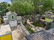 Charming house with a large backyard, detached garage, and mature trees at 7754 Westmoreland Dr, Sarasota, FL 34243