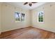 Spacious bedroom with hardwood floors and large windows at 7754 Westmoreland Dr, Sarasota, FL 34243