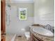 Clean bathroom with granite vanity and shower at 7754 Westmoreland Dr, Sarasota, FL 34243