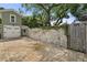 Spacious brick-paved driveway and detached garage with double doors at 7754 Westmoreland Dr, Sarasota, FL 34243
