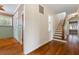 Hardwood staircase and hallway view at 7754 Westmoreland Dr, Sarasota, FL 34243