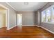 Spacious dining room with hardwood floors and elegant wallpaper at 7754 Westmoreland Dr, Sarasota, FL 34243