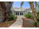 Pathway leading to the back of the house at 7754 Westmoreland Dr, Sarasota, FL 34243