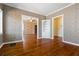 Bright dining room with hardwood floors and built-in shelving at 7754 Westmoreland Dr, Sarasota, FL 34243