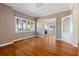 Hardwood floors and fireplace in the dining area at 7754 Westmoreland Dr, Sarasota, FL 34243