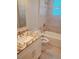 Well-lit bathroom with a vanity, shower, tub, and modern fixtures at 13126 Marathon Blvd, Port Charlotte, FL 33981