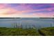 Waterfront view with a dock and tranquil water at 757 Hideaway Bay Dr, Longboat Key, FL 34228