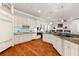 Bright kitchen showcases granite countertops, modern appliances, and ample cabinetry for efficient cooking and storage at 757 Hideaway Bay Dr, Longboat Key, FL 34228
