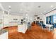 Well-equipped kitchen features stainless appliances, a center island with seating, and an open layout for culinary enjoyment at 757 Hideaway Bay Dr, Longboat Key, FL 34228