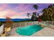 Backyard pool with hot tub, featuring waterfront view at 757 Hideaway Bay Dr, Longboat Key, FL 34228