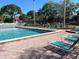 Inviting community pool with plenty of lounge chairs at 4601 46Th Street W Ct # 202B, Bradenton, FL 34210