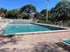 Inviting community pool with plenty of lounge chairs at 4601 46Th Street W Ct # 202B, Bradenton, FL 34210
