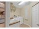 Convenient laundry room with washer, dryer, and utility sink at 6360 Watercrest Way # 301, Bradenton, FL 34202