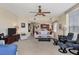 Spacious living area with comfortable seating and partial kitchen view at 6360 Watercrest Way # 301, Bradenton, FL 34202