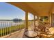 Spacious balcony with lake views and comfortable seating at 6360 Watercrest Way # 301, Bradenton, FL 34202