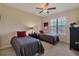 Guest bedroom with two twin beds and ample closet space at 6360 Watercrest Way # 301, Bradenton, FL 34202