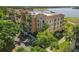 Aerial view of condo building near lake and golf course at 6360 Watercrest Way # 301, Bradenton, FL 34202
