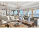 Bright and airy common area with comfortable seating and water views at 6360 Watercrest Way # 301, Bradenton, FL 34202