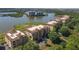 Aerial view of condo community by the lake and golf course at 6360 Watercrest Way # 301, Bradenton, FL 34202