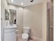 Clean bathroom with toilet, vanity, and shower at 6360 Watercrest Way # 301, Bradenton, FL 34202