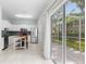 Kitchen with white cabinets, stainless steel appliances, and an island at 7632 Plantation Cir, Bradenton, FL 34201