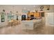 Spacious kitchen with an island, breakfast nook and stainless steel appliances at 8499 Topeka Cir, Port Charlotte, FL 33981