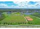 Soccer and baseball fields with surrounding green space at 10279 Morning Mist Ln, Sarasota, FL 34241