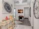 Elegant entryway with console table and nautical decor at 8624 Rain Song Rd, Sarasota, FL 34238