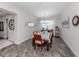 Formal dining room with wood table and chairs at 8624 Rain Song Rd, Sarasota, FL 34238