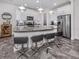 Modern kitchen with stainless steel appliances and granite countertops at 8624 Rain Song Rd, Sarasota, FL 34238