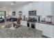 Modern kitchen with stainless steel appliances and granite countertops at 8624 Rain Song Rd, Sarasota, FL 34238