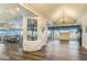Elegant clubhouse dining room with hardwood floors and large windows at 4726 Sand Trap Street E Cir, Bradenton, FL 34203